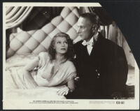 Rita Hayworth and George Macready in a scene from Gilda