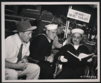 Assistant Director Nate Slott, William Bendix and Groucho Marx rest in between scenes of A Girl in Every Port
