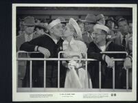 William Bendix, Marie Wilson kiss as Groucho Marx and extras looks on in A Girl in Every Port
