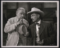 Gene Lockhart shushes Groucho Marx in a scene from A Girl in Every Port