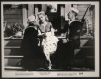 William Bendix and Groucho Marx woo Marie Wilson in a scene from A Girl in Every Port
