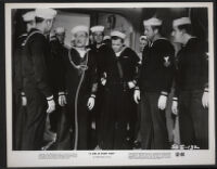 Groucho Marx and sailors in a scene from A Girl in Every Port