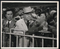 Teddy Hart, Gene Lockhart and George E. Stone watch horse racing in A Girl in Every Port