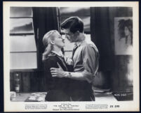 Mai Zetterling and Robert Beatty embrace in The Girl in the Painting