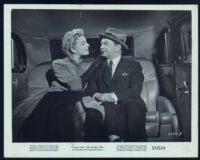 Kathleen Hughes and Edward G. Robinson in The Glass Web