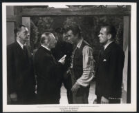Ray Milland, Reinhold Schnuzel, and cast members in Golden Earrings