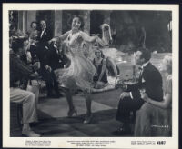 Dancer and extras in The Great Gatsby