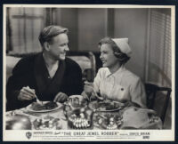 David Brian and Marjorie Reynolds enjoying a meal in The Great Jewel Robber