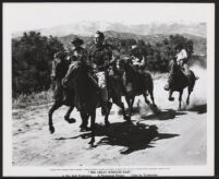 Wendell Corey and cast members riding horses in The Great Missouri Raid
