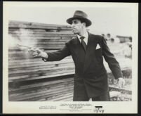 Ray Julian fires a shot on the set of Guilty Bystander