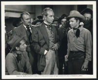 Audie Murphy, Donald Randolph, and Jack Kelly in Gunsmoke