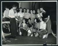 Unidentified dancers and dance director Jack Billings rehearsing for Happy-Go-Lucky
