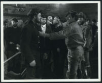 James Cardwell and John Bromfield prepare to fight among Holly Bane and cast members in Harpoon