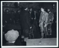 James Cardwell confronts John Bromfield among Holly Bane and cast members in Harpoon