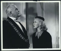 Ginger Rogers speaks to the butler in Heartbeat