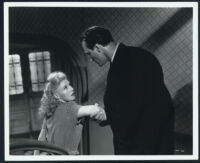 Ginger Rogers and Basil Rathbone argue in Heartbeat