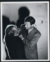 Robert Taylor fighting an unidentified cast member in High Wall