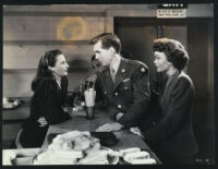 Robert Hutton, Wyman Jane, and Barbara Stanwyck in Hollywood Canteen