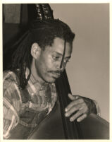 Oscar Brown III playing double bass, Los Angeles, October 1995 [descriptive]