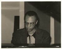 Billy Childs playing the piano in Los Angeles, June 1999 [descriptive]