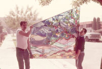 Artists carrying stained glass