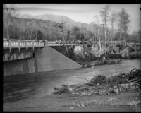 Workers repair a bridge after damage from record-breaking rains, La Crescenta-Montrose, 1934