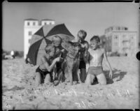 Boys with dog on Venice Beach, circa 1934