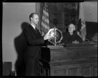 Deputy Prosecutor L.C. Avery poses with Judge Thomas L. Ambrose in a courtroom, Los Angeles, 1934