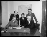 District Attorney Buron Fitts meets with his advisors over perjury charges, Los Angeles, 1934