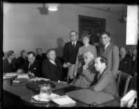 District Attorney Buron Fitts and his sister Mrs. Berthal Gregory appear with their attorneys, Los Angeles, 1934