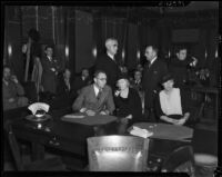 District Attorney Buron Fitts, his wife Marion Fitts, and his sister Berthal Gregory appear with their attorneys, Los Angeles, 1934