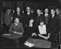 District Attorney Buron Fitts, his wife Marion Fitts, and his sister Berthal Gregory appear with their attorneys, Los Angeles, 1934