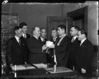 Arch-Abbott S. Ohtani presents Mayor Frank L. Shaw with a gift, Los Angeles, 1934
