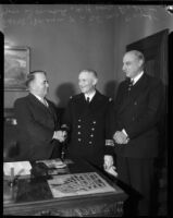 Capt. Yves Donval poses with French Consul Henri Didot and Mayor Frank L. Shaw, Los Angeles, 1935