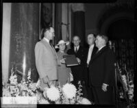 Fire Chief Ralph J. Scott receives a hand-illuminated book at a surprise party in his honor, Los Angeles, 1935