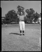 College football referee Bruce Kirkpatrick demonstrating hand signals, Los Angeles, circa 1935
