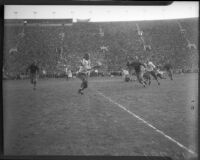 Play between USC and UCLA at the Coliseum, Los Angeles, 1935