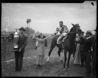 Jockey George Woolf on horse Top Row
