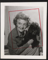 Laura Huxley, portrait with dog [descriptive]