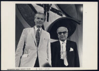 Aldous Huxley with Indian Ambassador M. C. Chagla at Dartmouth College, Hanover NH [descriptive]