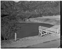 Flood basins above Altadena filled with rainwater.  Circa February 15, 1936.