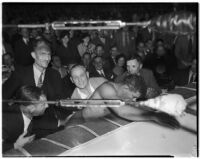 Wrestler Dean Detton at the side of the ring during a match against Bronko Nagurski at Olympic Auditorium, Los Angeles, 1937-1938