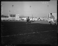 Fairfax vs. Marshall High School during a PTA benefit football tournament at the Coliseum, Los Angeles, November 24, 1937