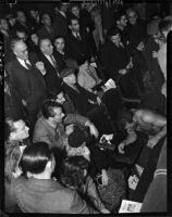 Wrestler Dean Detton fallen out of the ring during his match against Bronko Nagurski at Olympic Auditorium, Los Angeles, November 17, 1937