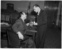 Attorney A. Brigham Rose and grand jury member Clifford E. Clinton facing charges of contempt, Los Angeles, December 1937