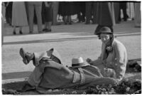 Spectators take a break on opening day of Santa Anita's fourth horse racing season, Arcadia, December 25, 1937