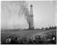 Debris shoots into the air during an explosion at Richfield Oil Company's El Segundo well, December 1937
