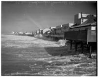 Heavy seas batter the waterfront at Redondo Beach, January 1940