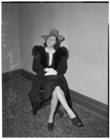 Mrs. Ella Peskay sitting in a courtroom, Los Angeles