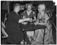 Mrs. Ellwood K. Lightholder, Mrs. Henry H. Robinson, and Mrs. John H. Harris, clubwomen playing cards, Los Angeles, circa 1940